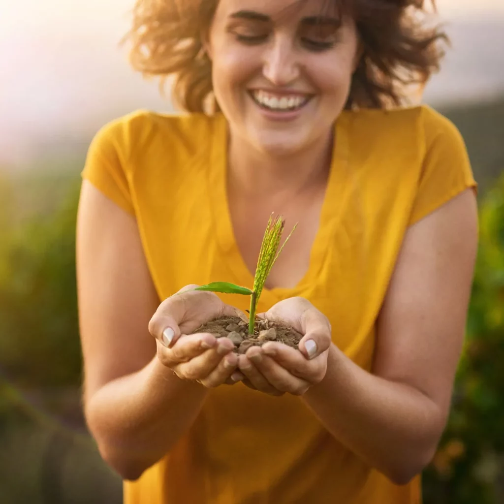 Woman holding a growing plan - cover image for adulting checklist post